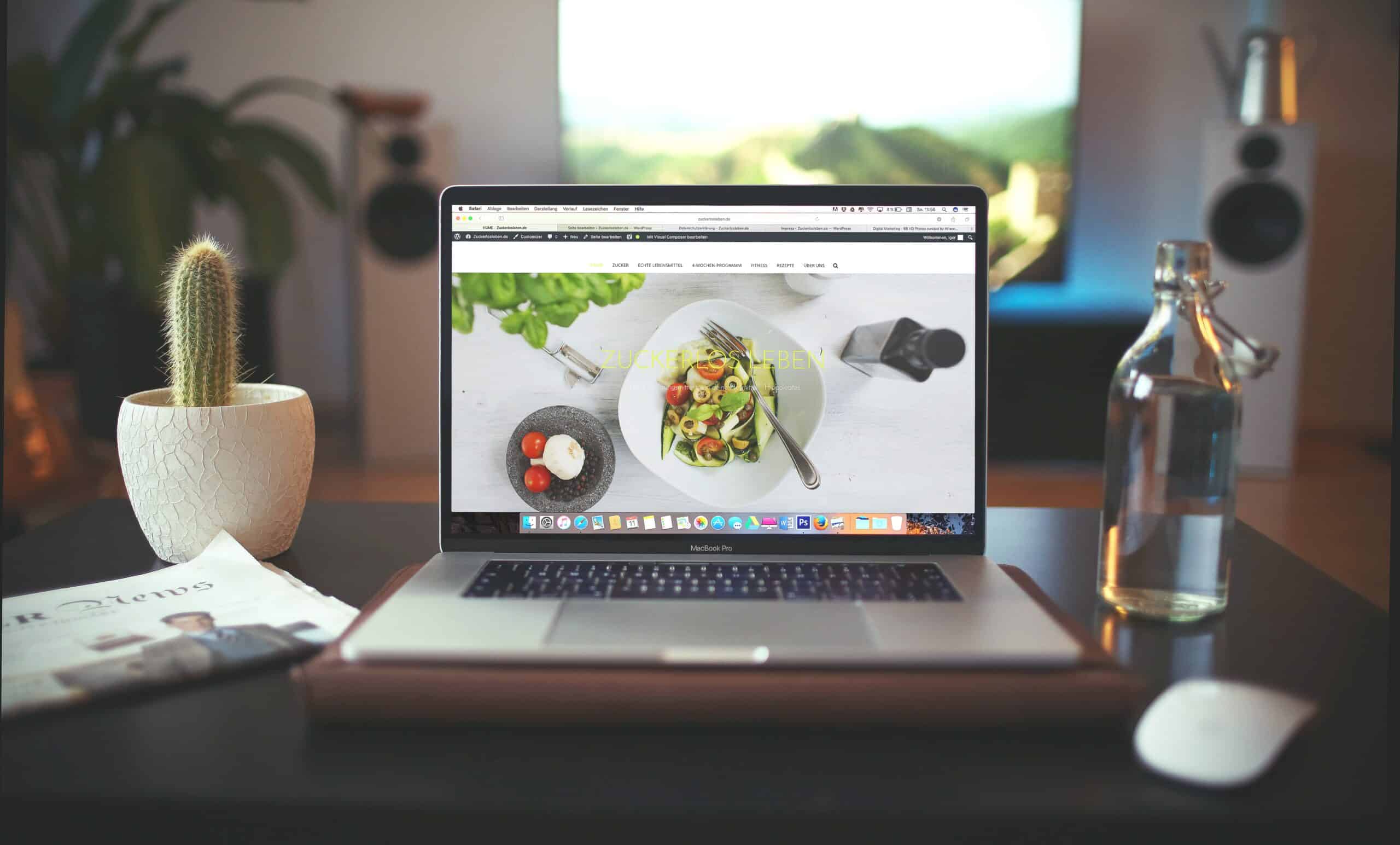 San Diego SEO Company - laptop on desk with local restaurant website - Ascendance Website Solutions Local SEO Experts