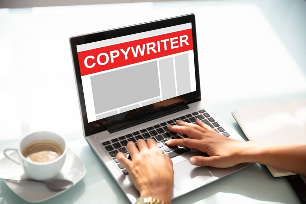 Website Copywriting Services San Diego - woman drinking coffee and working on copywriting on laptop - Ascendance Website Solutions