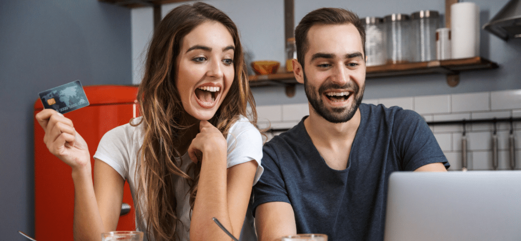 photo of couple excited to find a product online from ecommerce social media marketing
