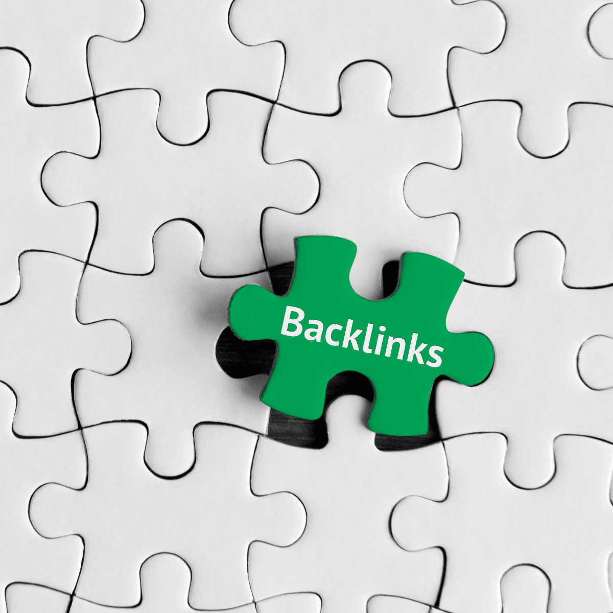 photo of puzzle piece that says backlinks fitting perfectly in place showing link insertions services for SEO