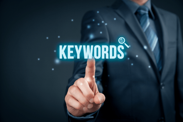 man pointing to the seo keywords for real estate seo strategy