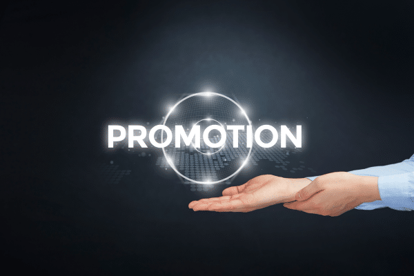 photo of person with promotion above their hands showing blog advertising is free promotion