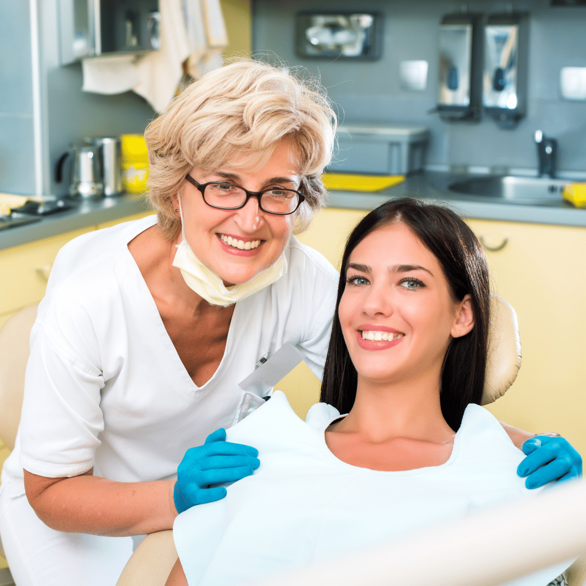 photo of dentist and happy patient who found her thanks to quality dental practice website design.