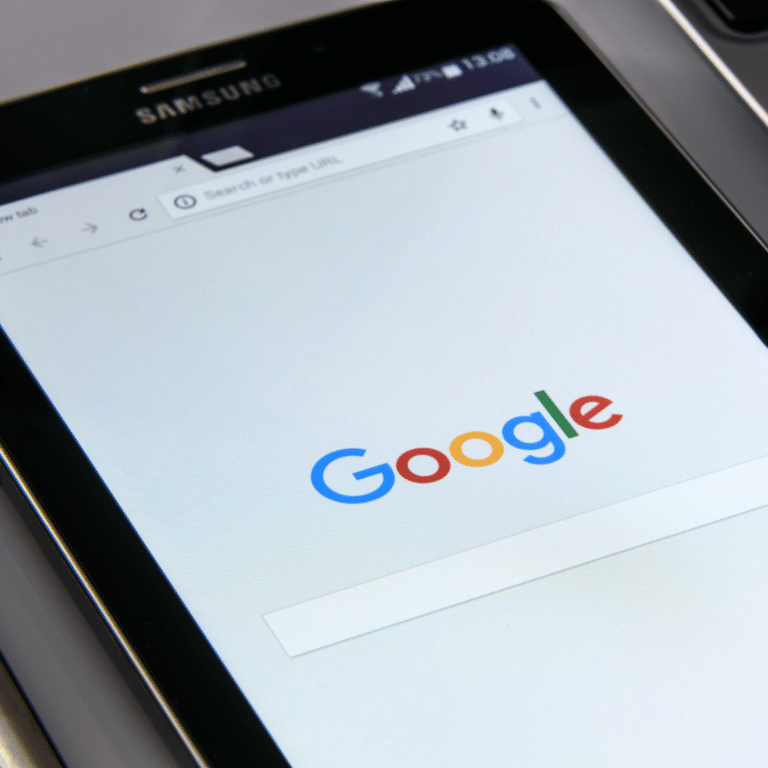 photo of tablet showing google search for franchise google advertising