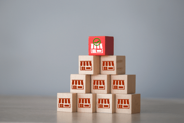 photo of blocks stacked in a pyramid with franchise icons